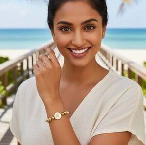 Gold Tone bead heart bracelet